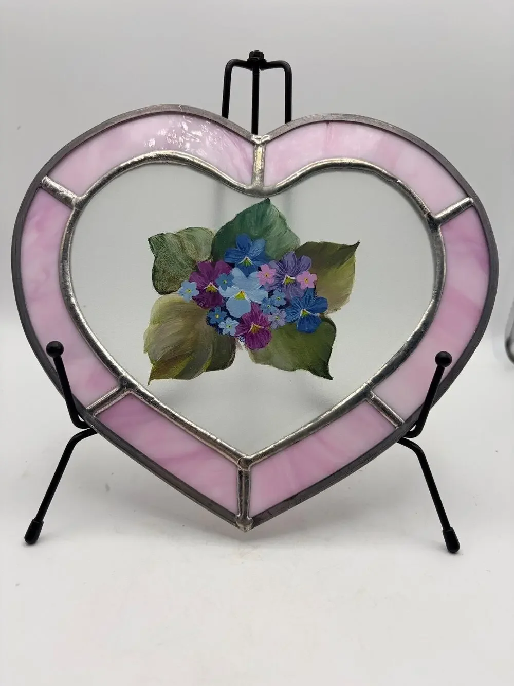 Stained glass heart. With a hand painted floral design.